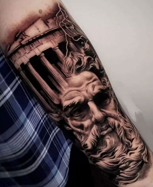 Mix of Zeus's face and an old Greek building tattoo.