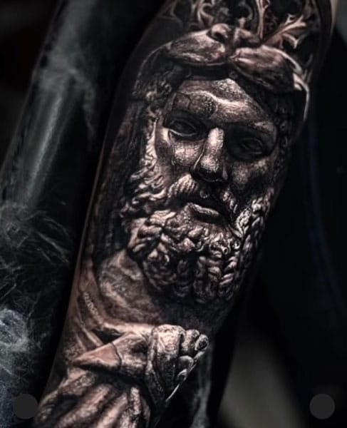 Hyper realistic tattoo of Zeus.