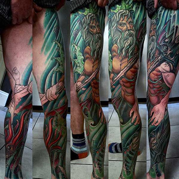 Full leg and full color tattoo of Zeus.