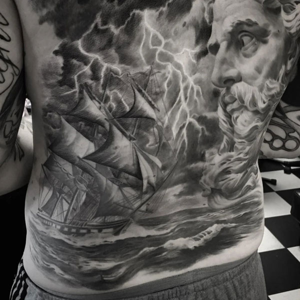 Very large tattoo of Zeus, the ocean, and a ship.