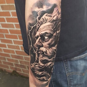 Zeus tattoo with clouds and lightning. 
