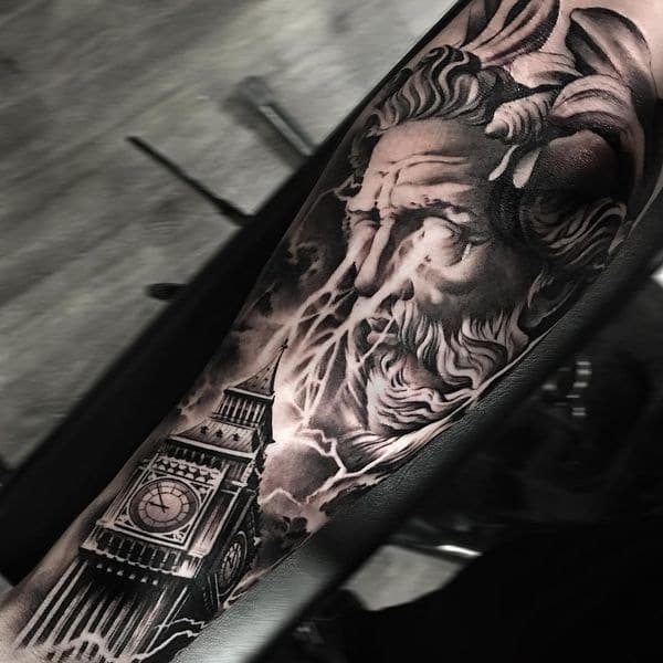 Zeus beaming down with lightning on Big Ben tattoo.