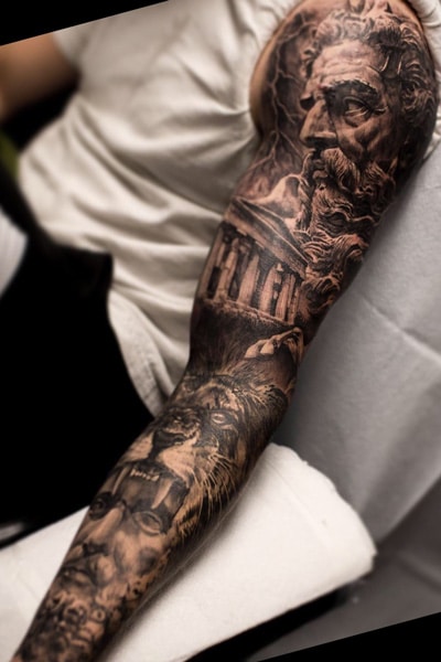 Zeus Sleeve tattoo done in a realistic tattoo that is full of Greek mythology. Vlogigurl of. 