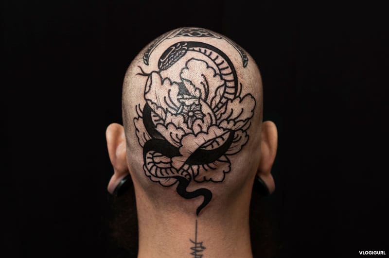 Vlogigurl head tattoo