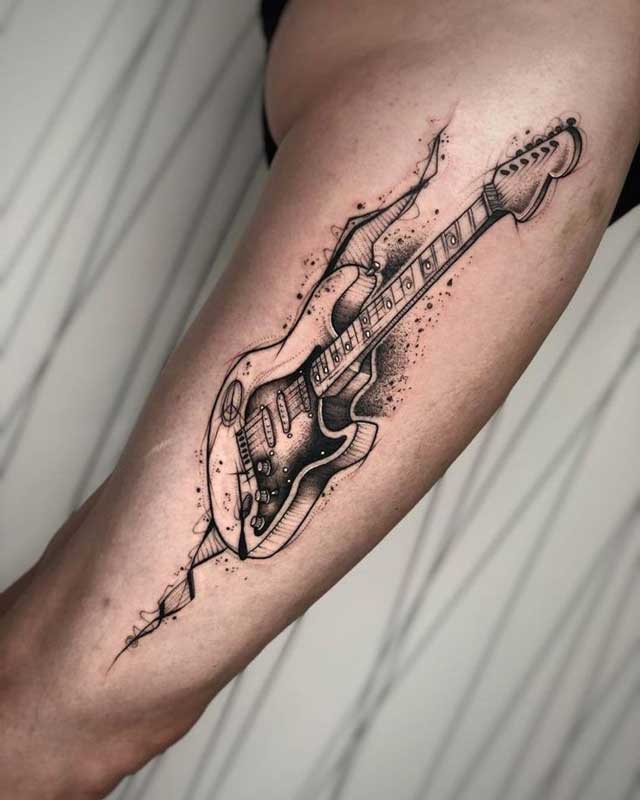 Music Tattoo of a guitar 